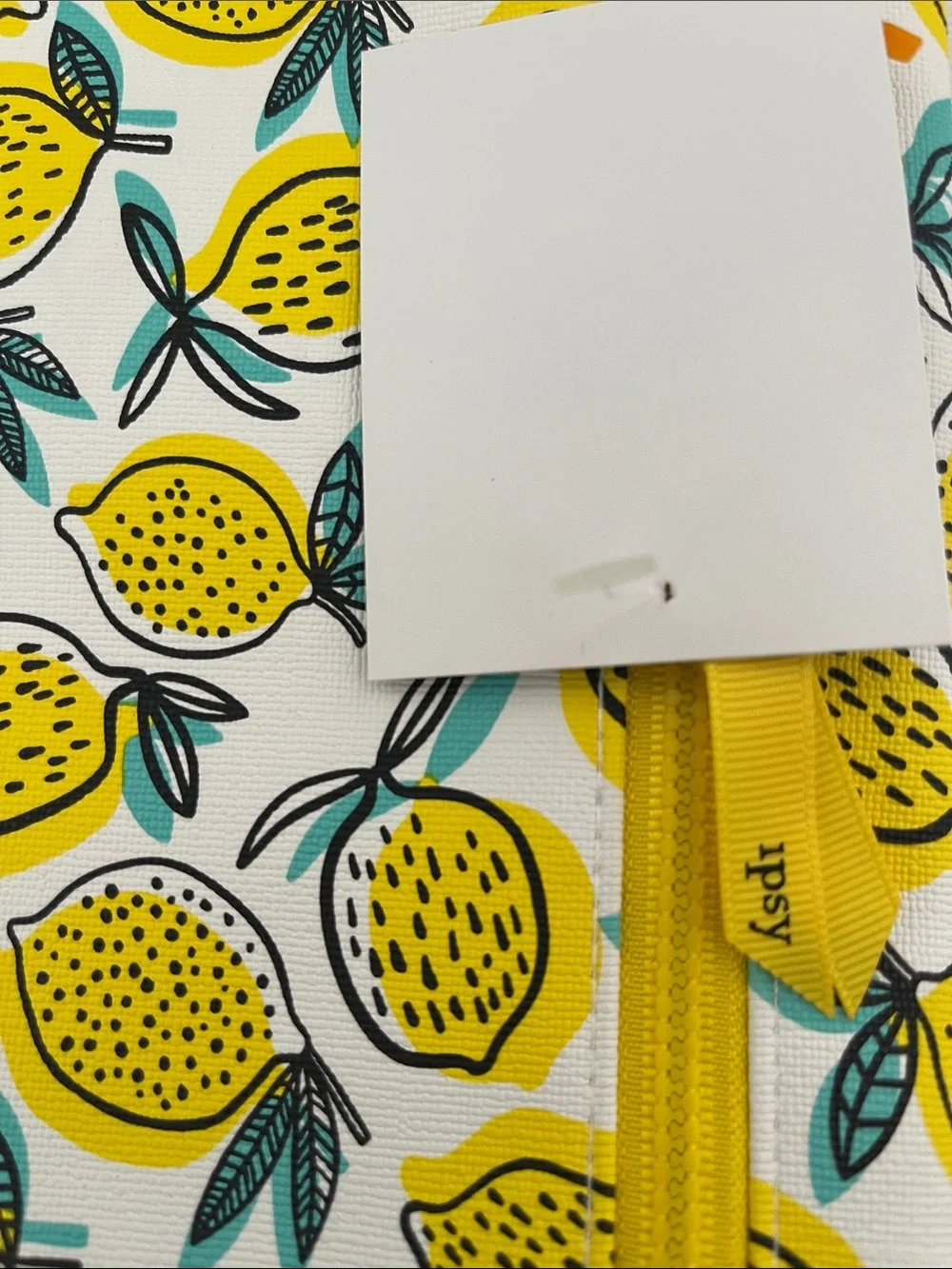 Cosmetic bag, pouch lemon print. By Ipsy material plastic, new